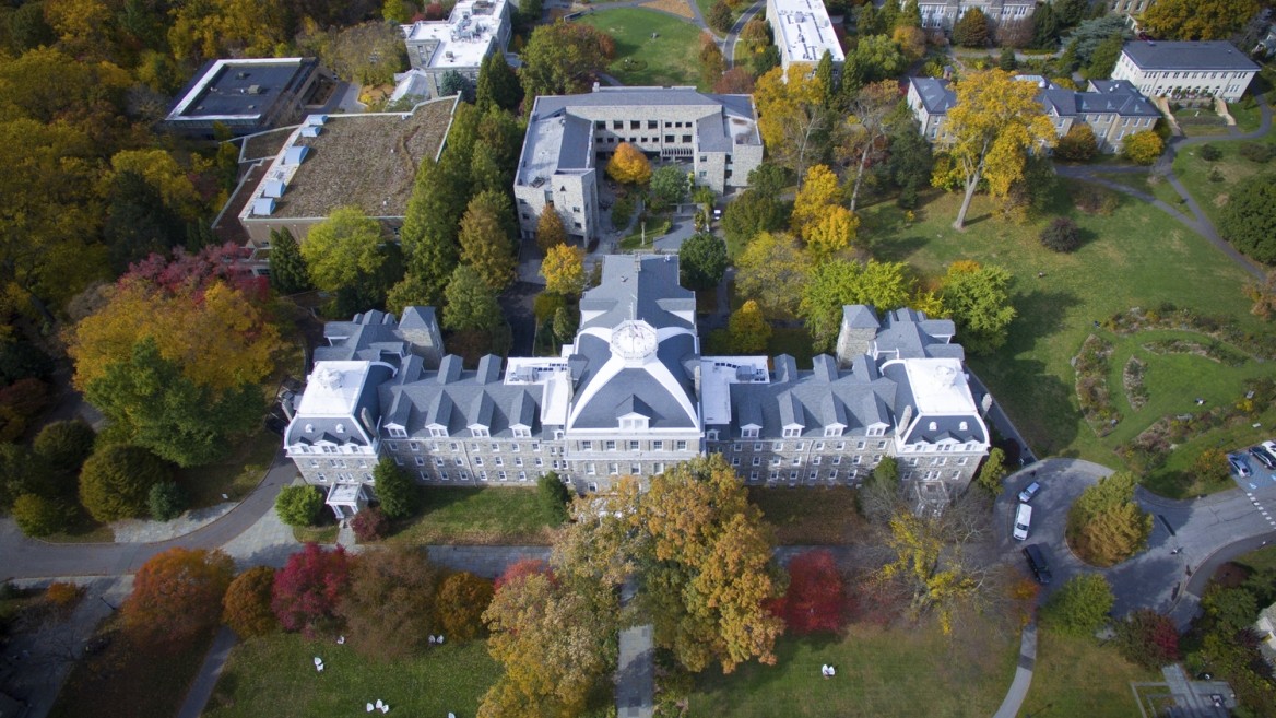 Aerial drone photography of the Swarthmore College campus displaying the fall foilage and skylin