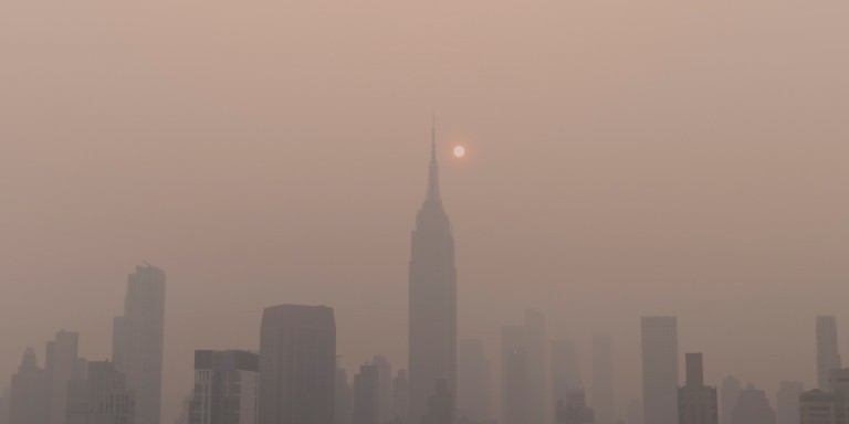 New York City skyline, including the Empire State Building, wreathed in wildfire smoke in June 2023